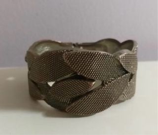 Pulsera dorada y plateada con diseño de hojas