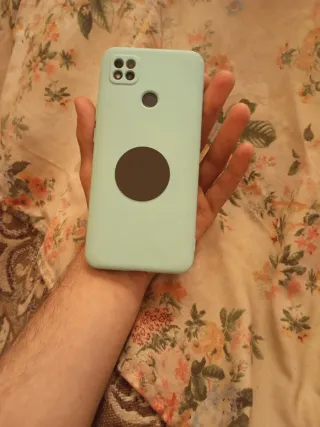 Móvil Negro y Funda Verde