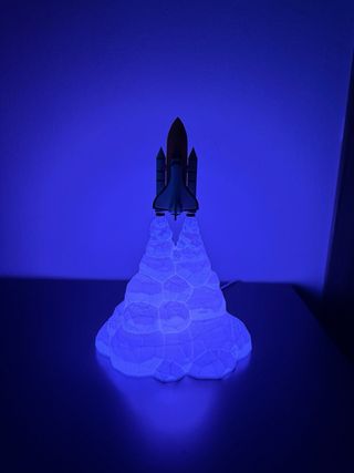 Lampada razzo 3D LED effetto decollo