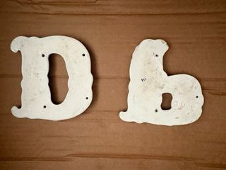 Letras de cerámica P y D