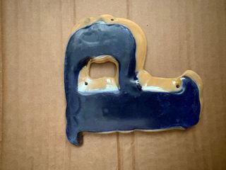 Letras de cerámica P y D