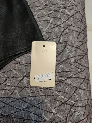 Falda efecto piel asimétrica y falda cuadros