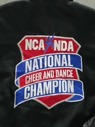 Giacca Varsity NCA National Cheer Champion
