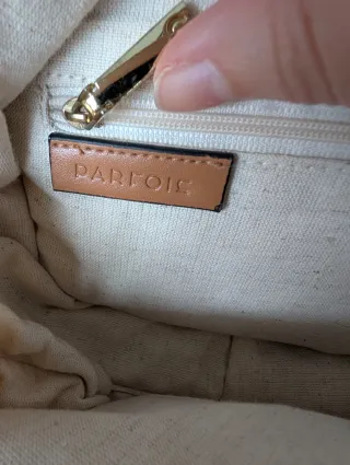 Bolso redondo Parfois conchas