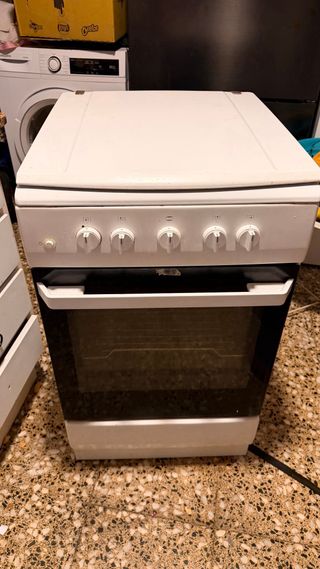 Cocina 4 fuegos y horno eléctrico