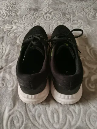 Zapatillas running Asics negras y verdes