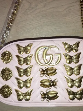 Borsa rosa con farfalle e leoni