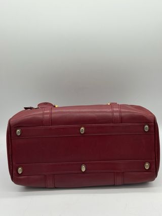Bolso Cartier Piel burdeos.