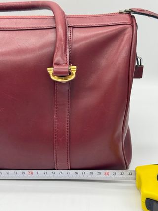 Bolso Cartier Piel burdeos.