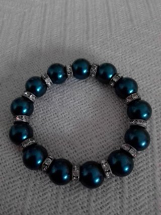 Pulsera plateada con charm de corazón