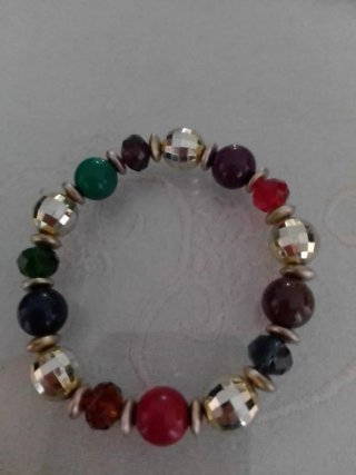Pulsera plateada con charm de corazón