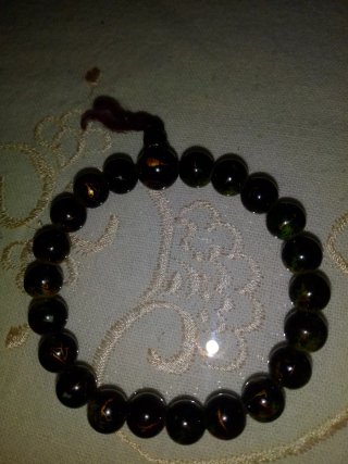 Pulsera plateada con charm de corazón