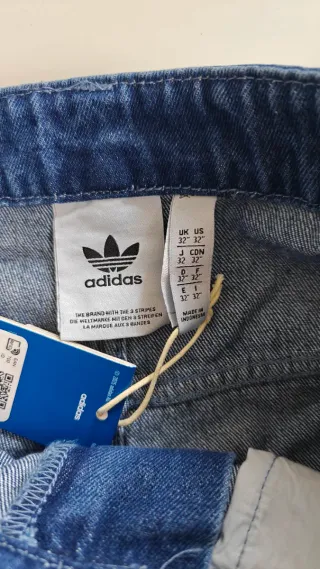 Pantalón corto vaquero Adidas firebird adicolor