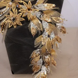 Applicazione paillettes oro e argento