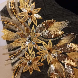 Applicazione paillettes oro e argento
