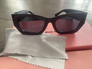 Gafas de sol Miu Miu Negras
