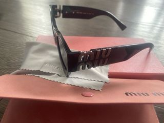 Gafas de sol Miu Miu Negras