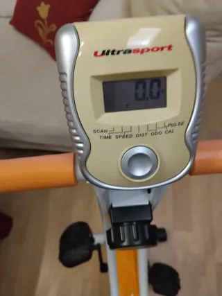 Bicicleta Estática Naranja y Blanca