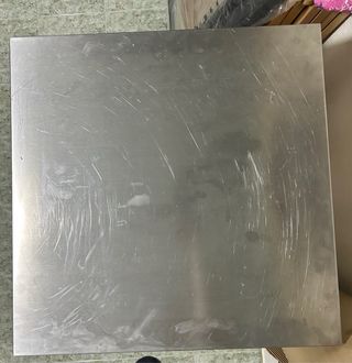 Mesa de acero inoxidable con estante