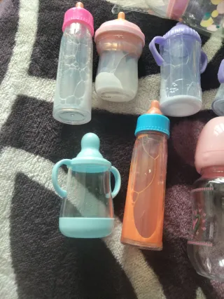 Biberones de juguete varios colores