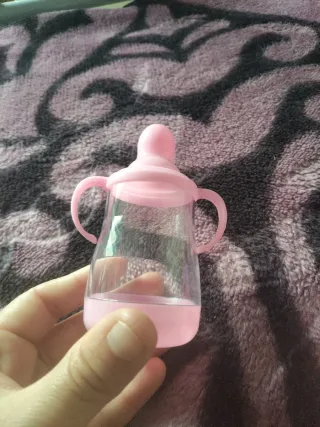 Biberones de juguete varios colores