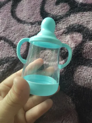 Biberones de juguete varios colores