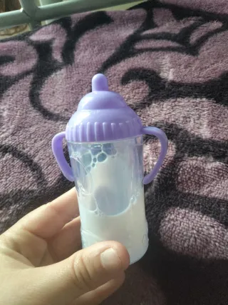 Biberones de juguete varios colores