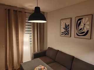 Sofá de 3 plazas en tela 1 año