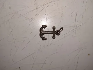 Talismán antiguo de metal