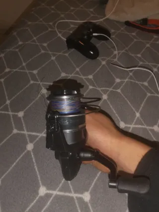 Carrete Caperlan con hilo trenzado