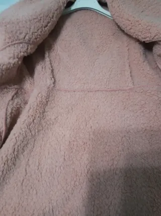 Elegante abrigo entallado rosa