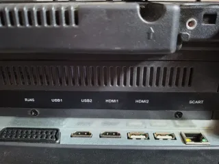 Televisión NPG y soporte pared