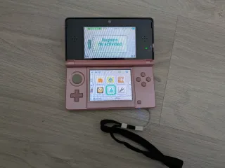 Nintendo 3DS Coral Pink + 2 Juegos