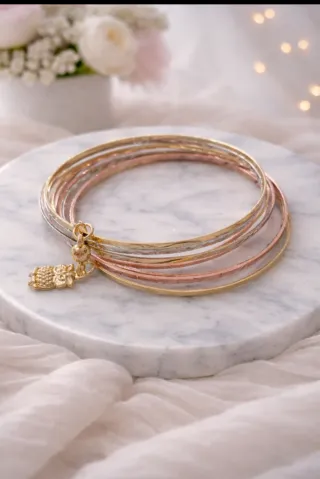 Conjunto 7 Brazaletes Oro Laminado