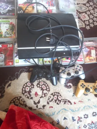 Console PS3 con 2 controller e 5 giochi