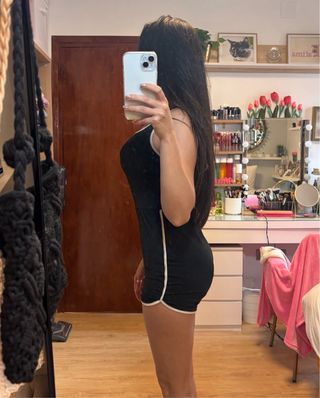 Mono deportivo negro con ribetes blancos Talla S