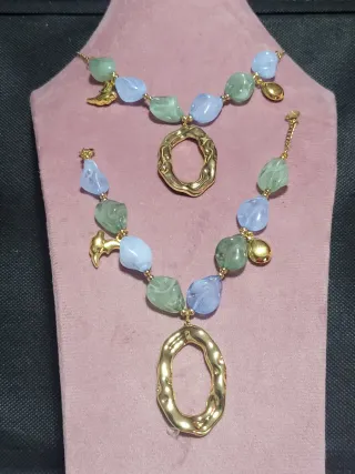 Collar y pulsera de acero con flores y otros model