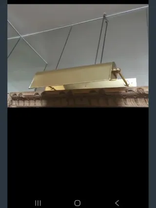 Aplique de luz para cuadros dorado