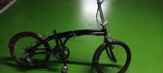 Bicicleta plegable negra (sin sillín)