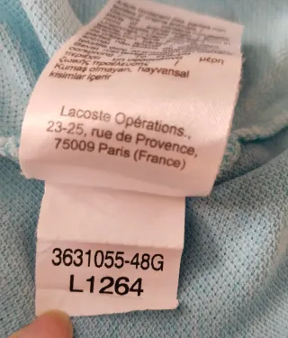Polo Lacoste Azul Talla M con imperfecciones