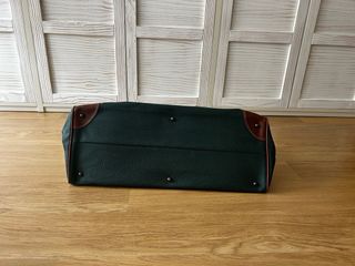 Bolsa de viaje de piel verde y marrón