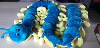 Peluche bruco blu e giallo