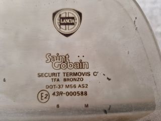 Luna trasera Lancia Delta Evo1 Bronzo