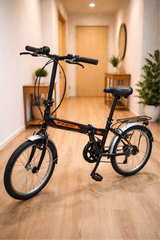 Bicicleta Plegable Negra y naranja.