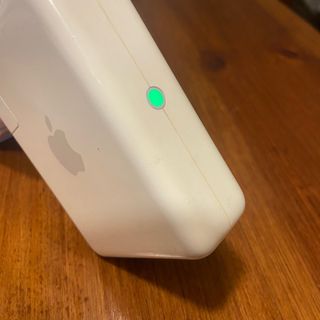 Airport Express 1ª gen + cable Toslink + adapador