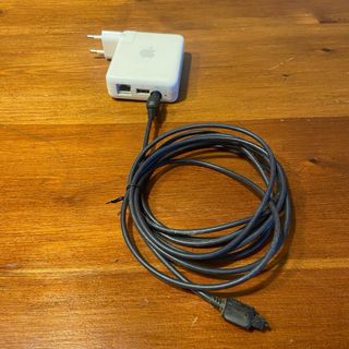 Airport Express 1ª gen + cable Toslink + adapador