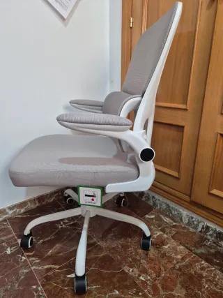 Silla de oficina ergonómica gris, nueva