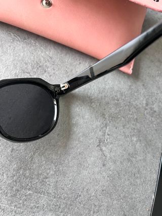 Gafas de sol Miu Miu geométricas negras