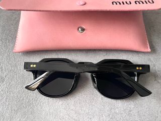 Gafas de sol Miu Miu geométricas negras