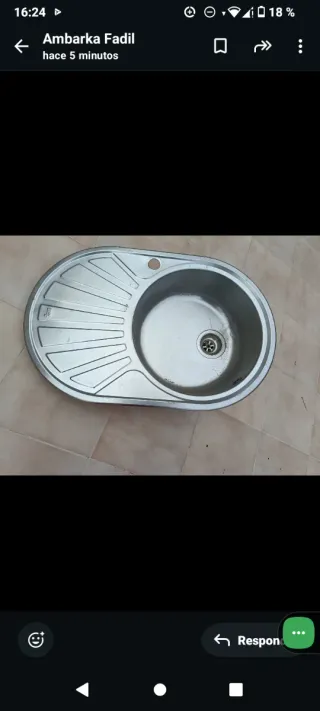 Fregadero de metal plateado los dos